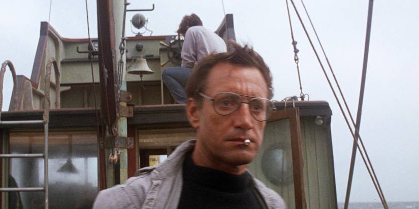Brody shocked by seeing the shark and smoking a cigarette in Jaws.