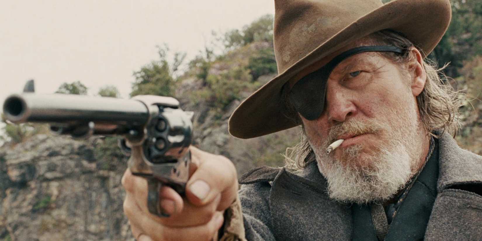 Deputy U.S. Marshal Rooster Cogburn (Jeff Bridges) aiming his revolver in True Grit