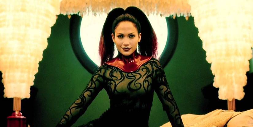 Dr. Catherine Deane, played by actor Jennifer Lopez, wearing a surreal outfit in The Cell (2000)