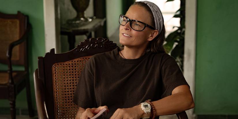 Джоди Фостер в роли Бонни Столл в коричневой футболке, очках и бандане в фильме "Няд".