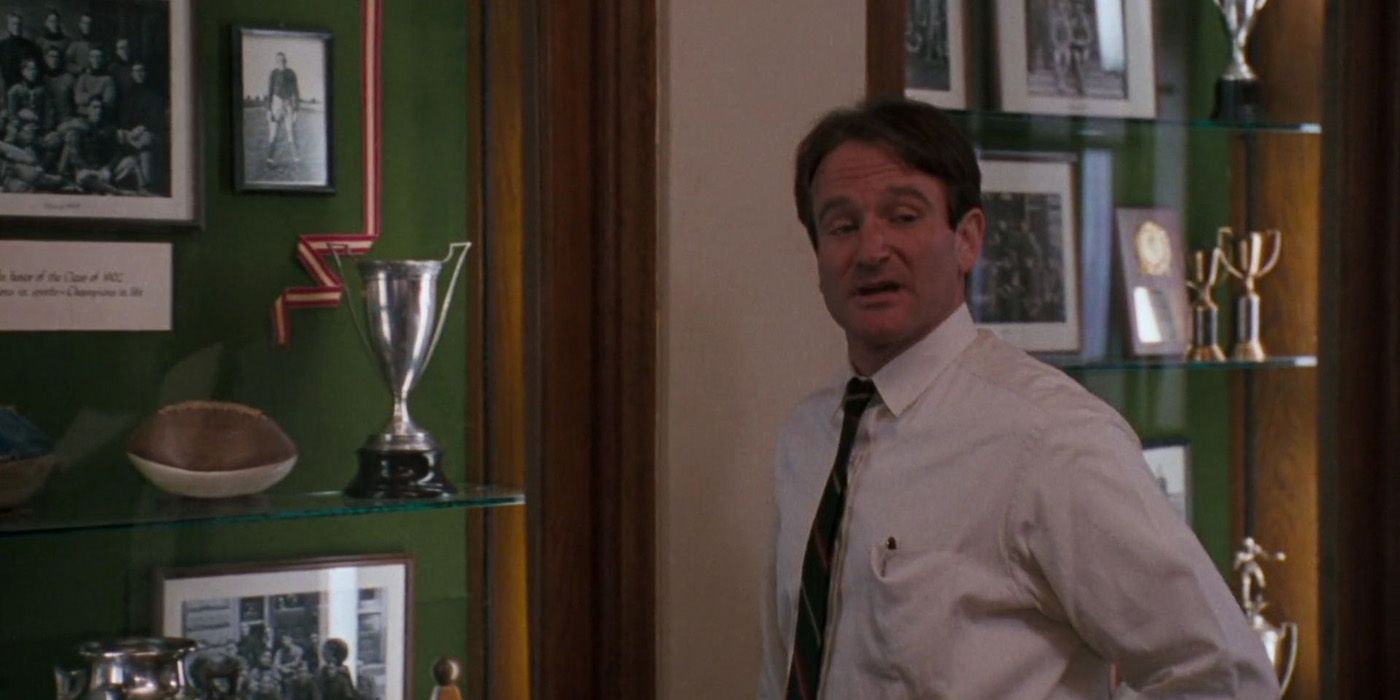 John Keating talking photos in Dead Poets Society