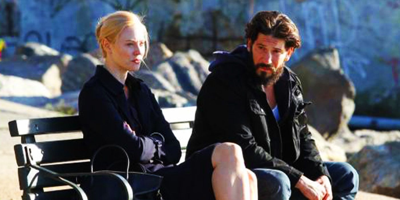 Karen Page and Frank Castle on a bench in The Punisher