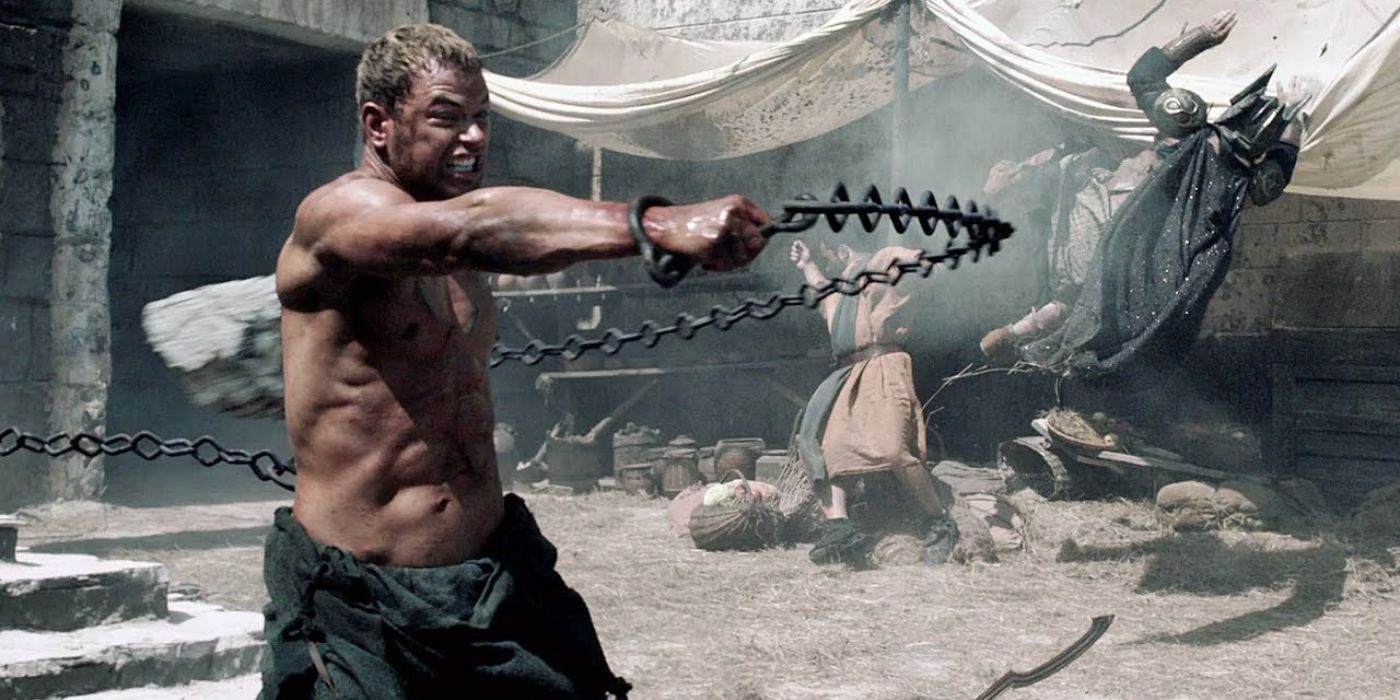 Kellan Lutz as Hercules whipping a chain in The Legend of Hercules