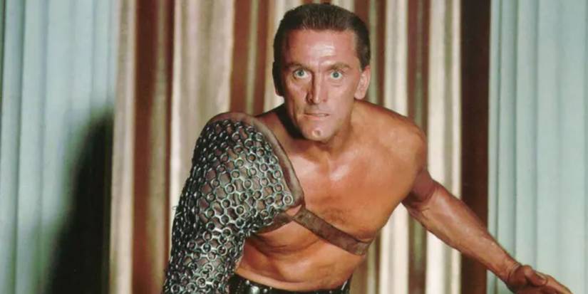 Kirk Douglas as Spartacus with chanmail strapped over one arm