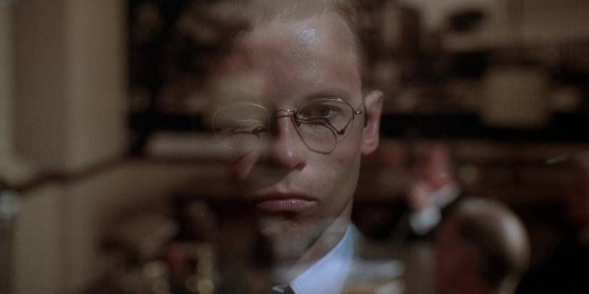 Guy Pierce as Ed Exley face reflected in glass LA Confidential 