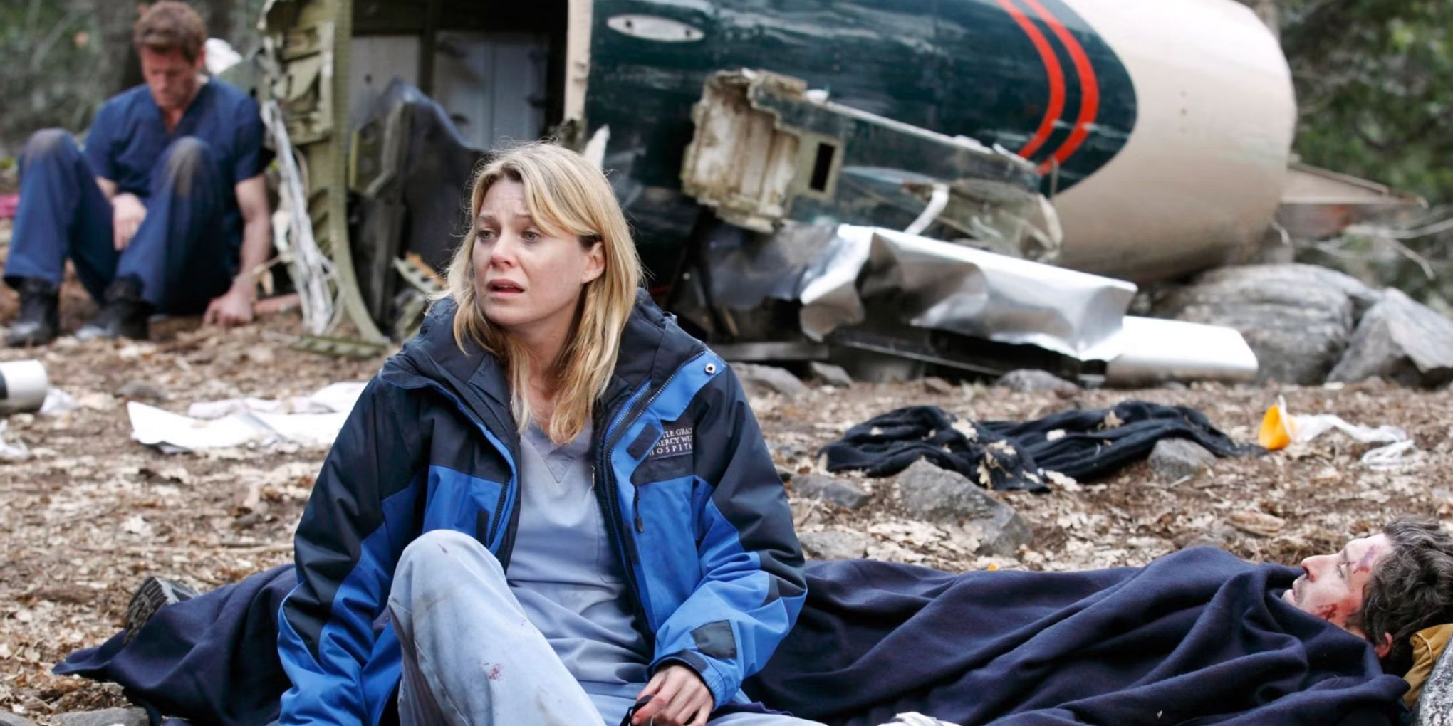 Meredith looks to the side while Mark and Derek are unconsciouss after the plane crash in Greys Anatomy