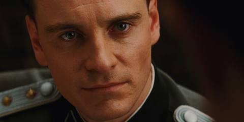 Michael Fassbender as Archie Hicox prepares for a gunfight in Inglourious Basterds.