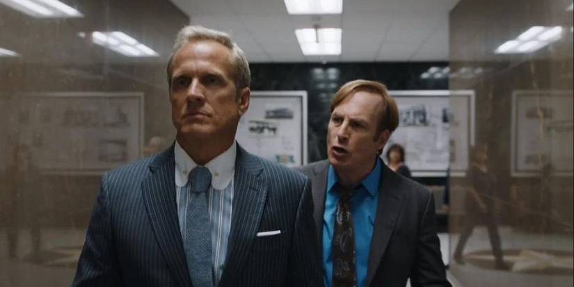 Patrick Fabian como Howard Hamlin se afastando de Bob Oedenkirk como Jimmy McGillsaul Goodman em Better Call Saul.
