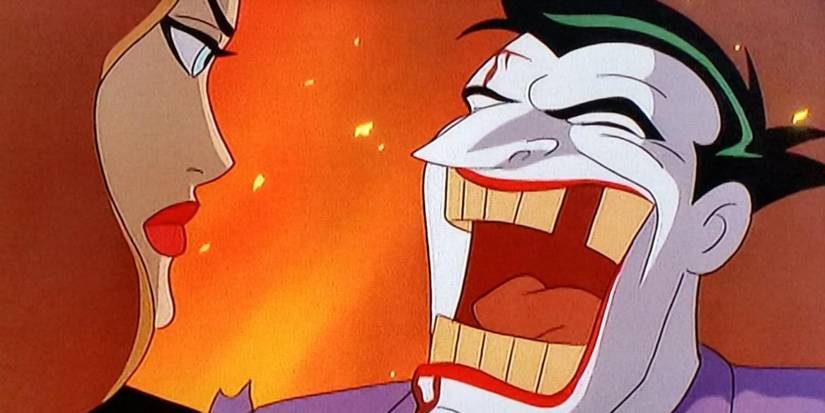 Phantasm staring at a laughing Joker in Batman Mask of the Phantasm