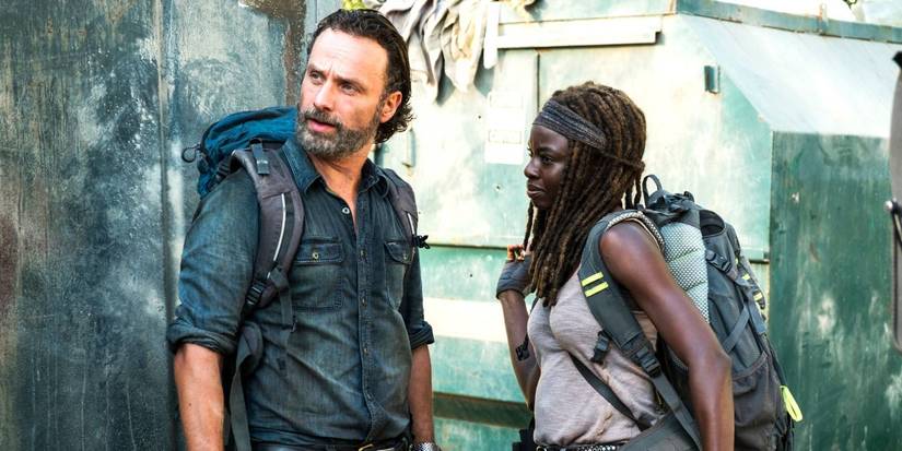 Rick Grimes and Michonne looking to the side in The Walking Dead