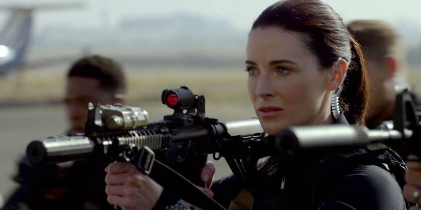 Sasha holding a big gun in The Last Ship