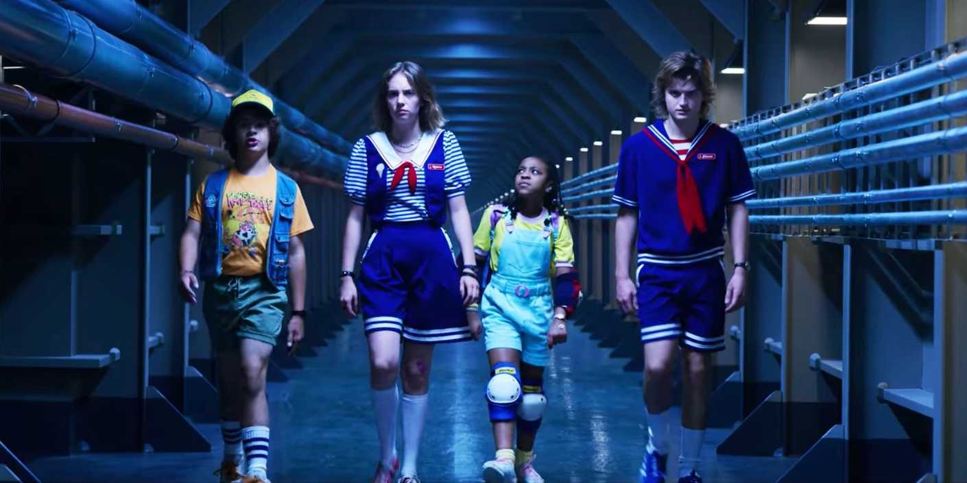 Dustin (Gaten Matarazzo), Robin (Maya Hawk), Erica (Priah Ferguson), and Steve (Joe Keery) as the Scoops Troop in Stranger Things season 3.