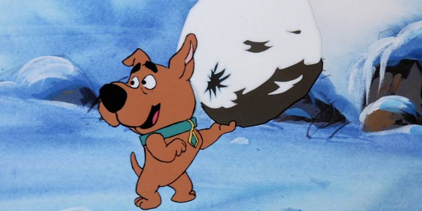 Scrappy-Doo segurando uma pedra coberta de neve