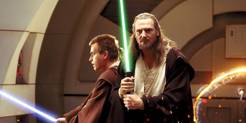 Star Wars Obi-Wan and Qui-Gon in The Phantom Menace holding their lightsabers as the Trade Federation droids attack them