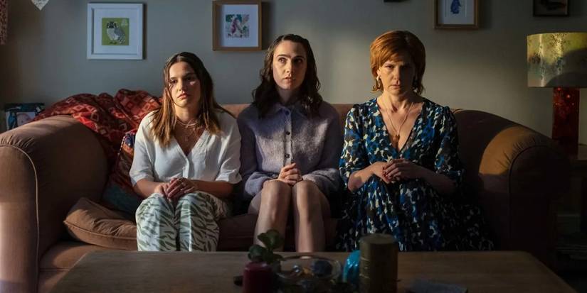 BIllie, Josie & Deb Sitting On The Couch Looking Upset In Such Brave Girls.jpg