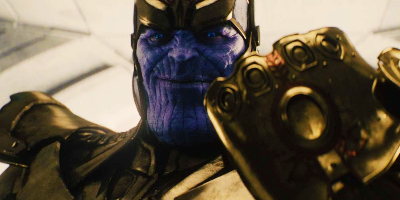 Josh Brolin as Thanos in Age of Ultron smiling as he wields an Infinity Gauntlet