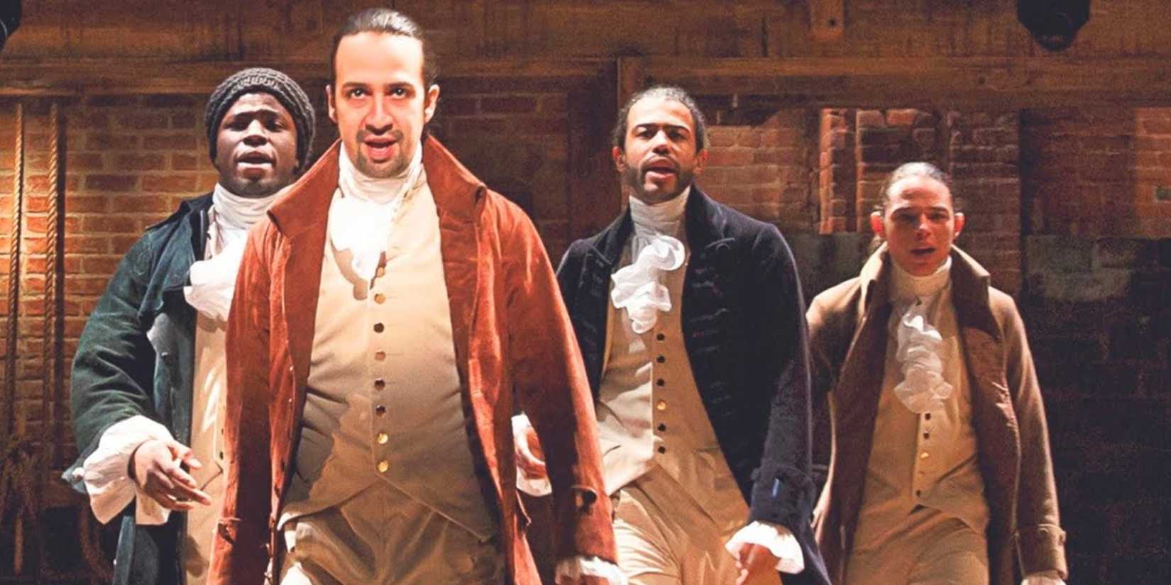 the men of hamilton walking toward the front of the stage in my shot in hamilton