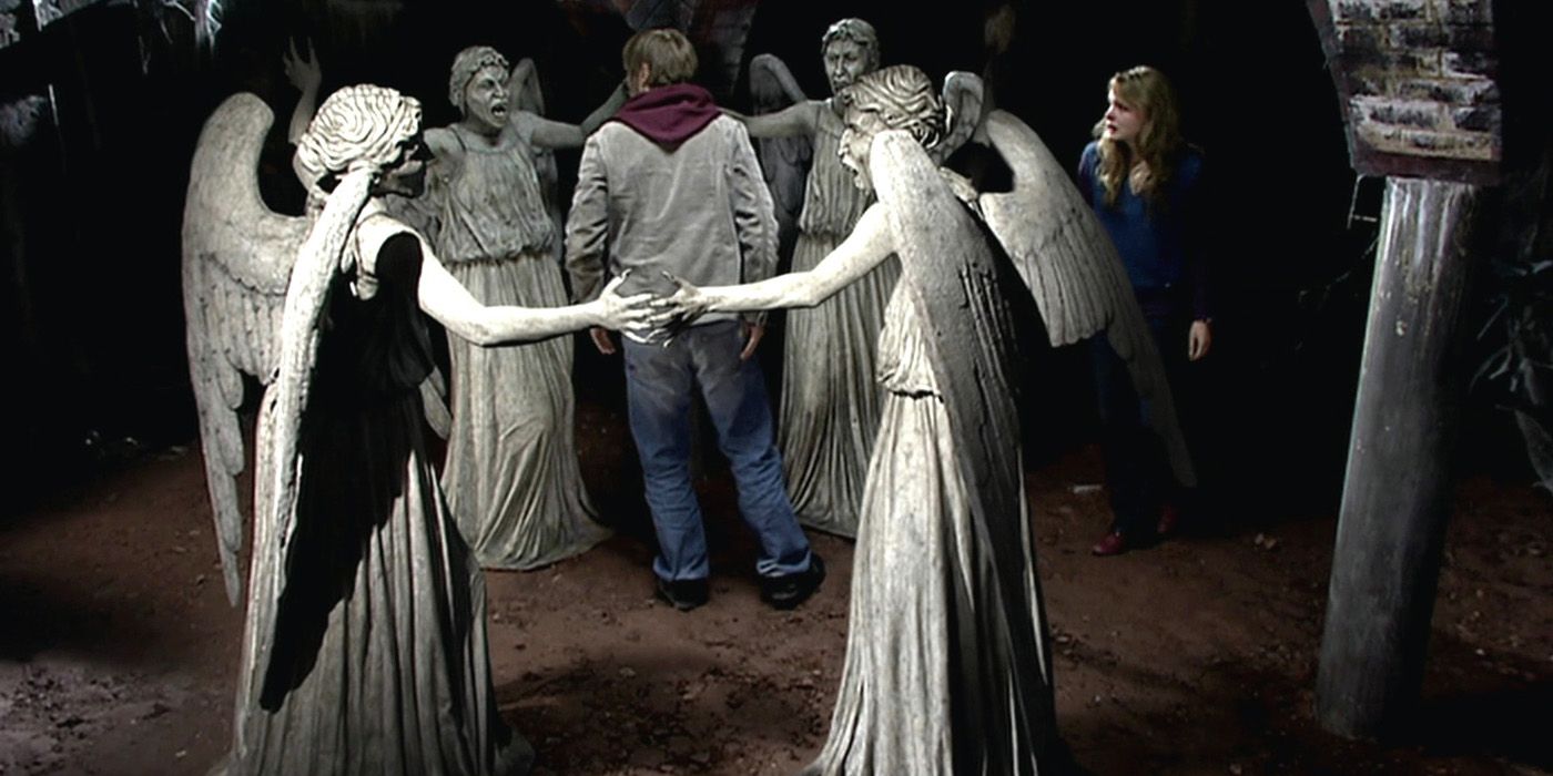 Larry Sparrow stood between the Weeping Angels after they are defeated in the Doctor Who episode Blink