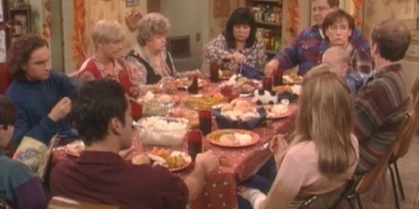 The whole family sitting at the kitchen table in the Roseanne episode Thanksgiving 1994