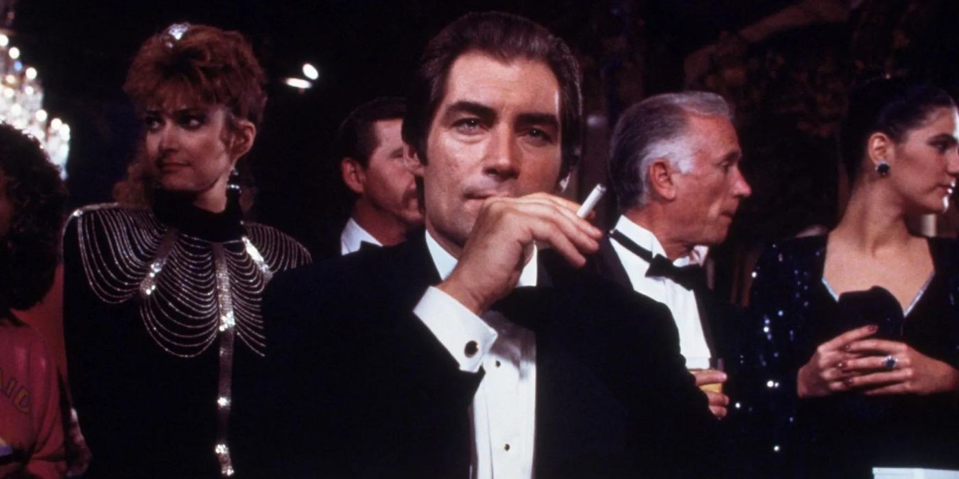 Timothy Dalton as James Bond Holds a Cigarette in License to Kill