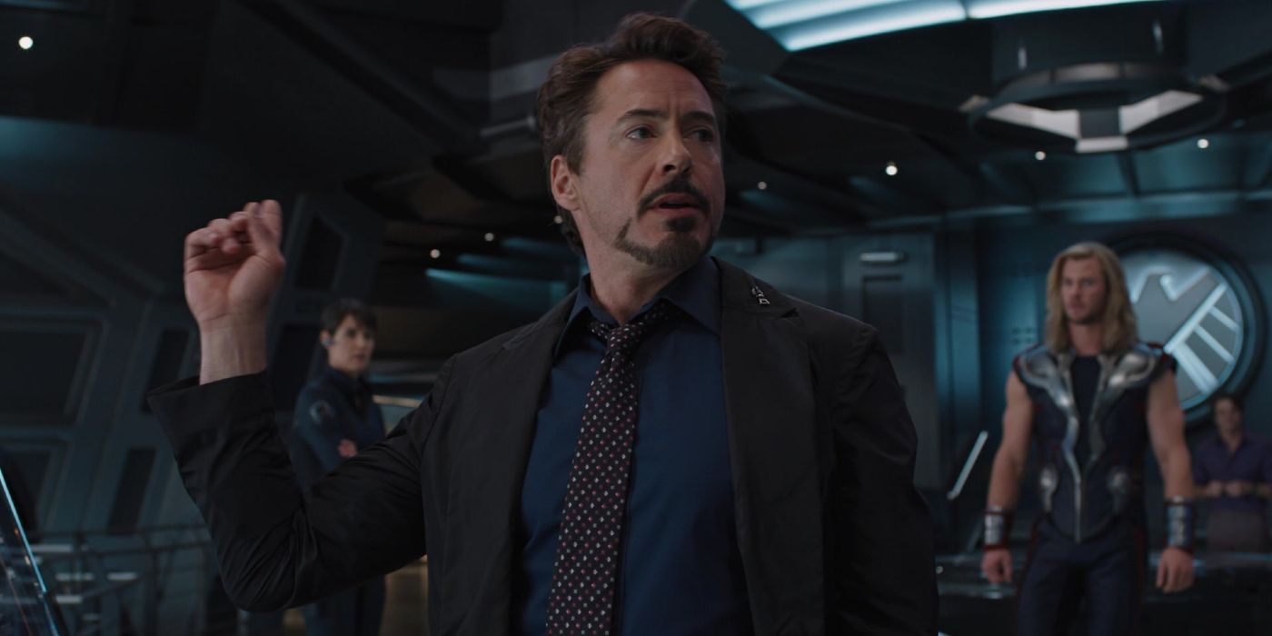 Robert Downey Jr. as Tony Stark addresses other Avengers on the SHIELD helicarrier in The Avengers (2012)