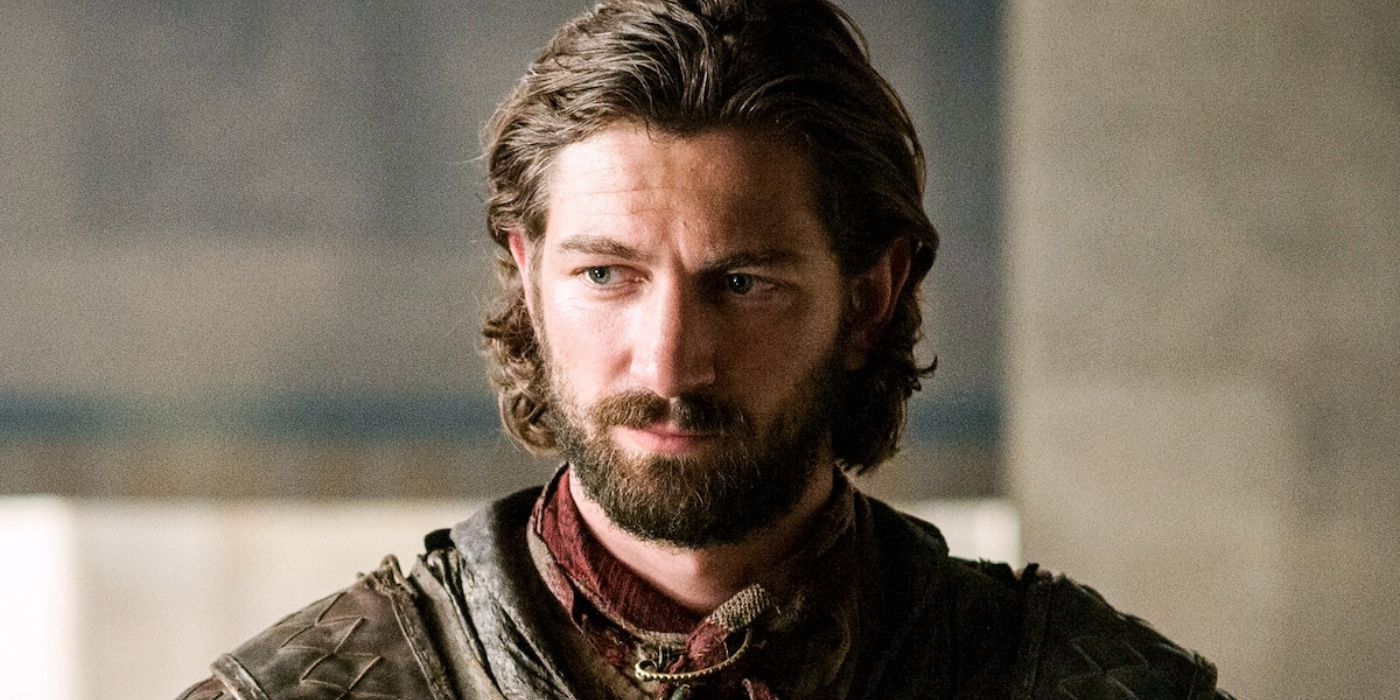 Michiel Huisman as Daario Naharis looking down in Game of Thrones