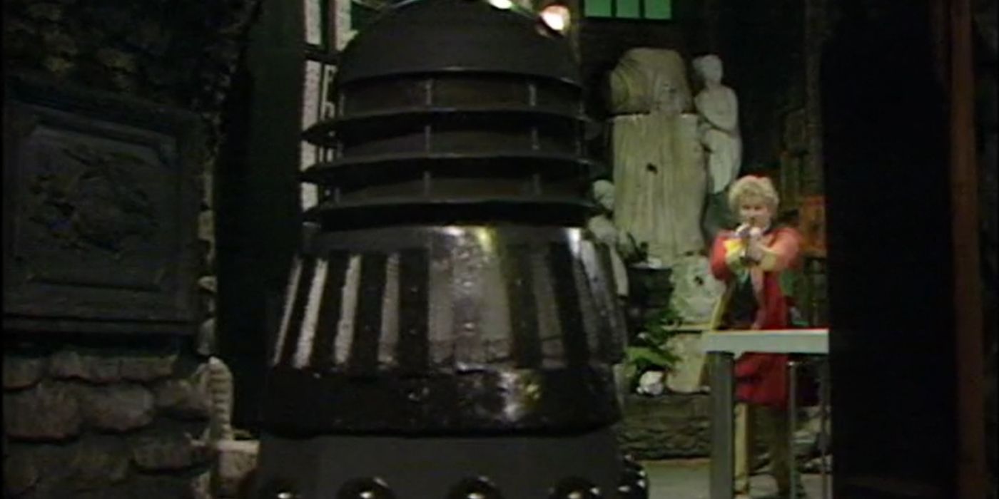 The Sixth Doctor (Colin Baker) shoots a Dalek in Doctor Who's Revelation of the Daleks