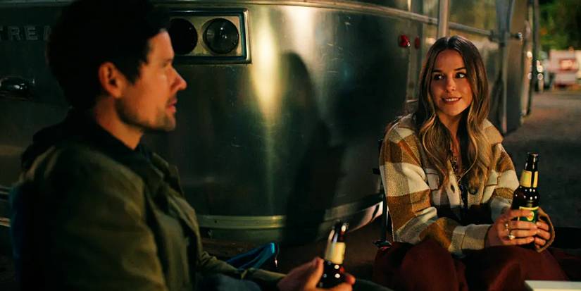 Virgin River's Lark and Brady drink a beer together.