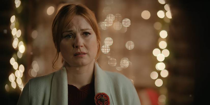 Mel looks upset and worried while talking to Everett in Virgin River.