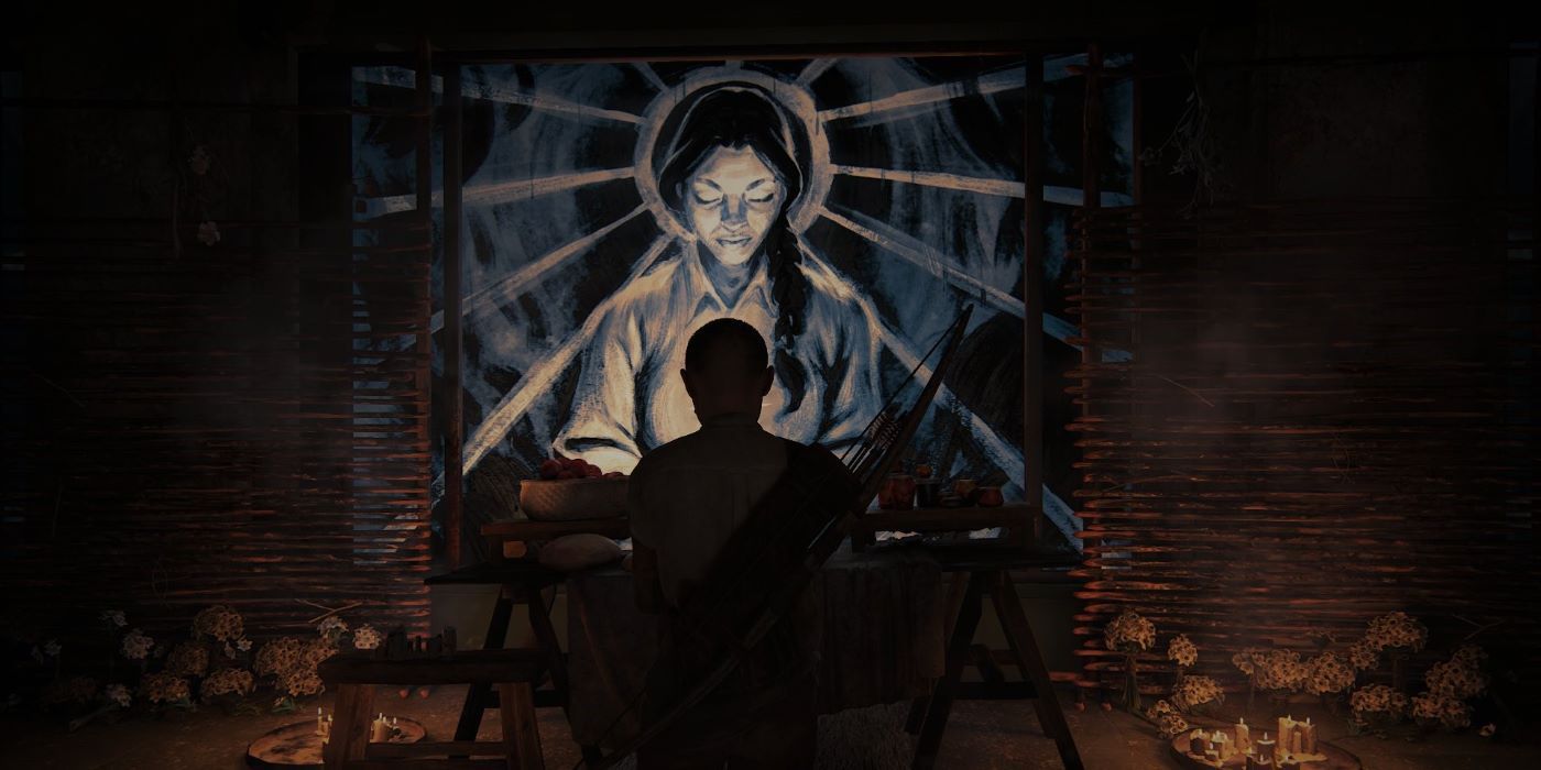 A shrine including a mural of the Seraphite Prophet in The Last of Us Part II