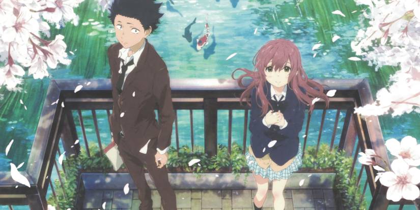 A Silent Voice Shouya and Shouko looking towards the camera, standing on a bridge over a koi pond and surrounded by petals