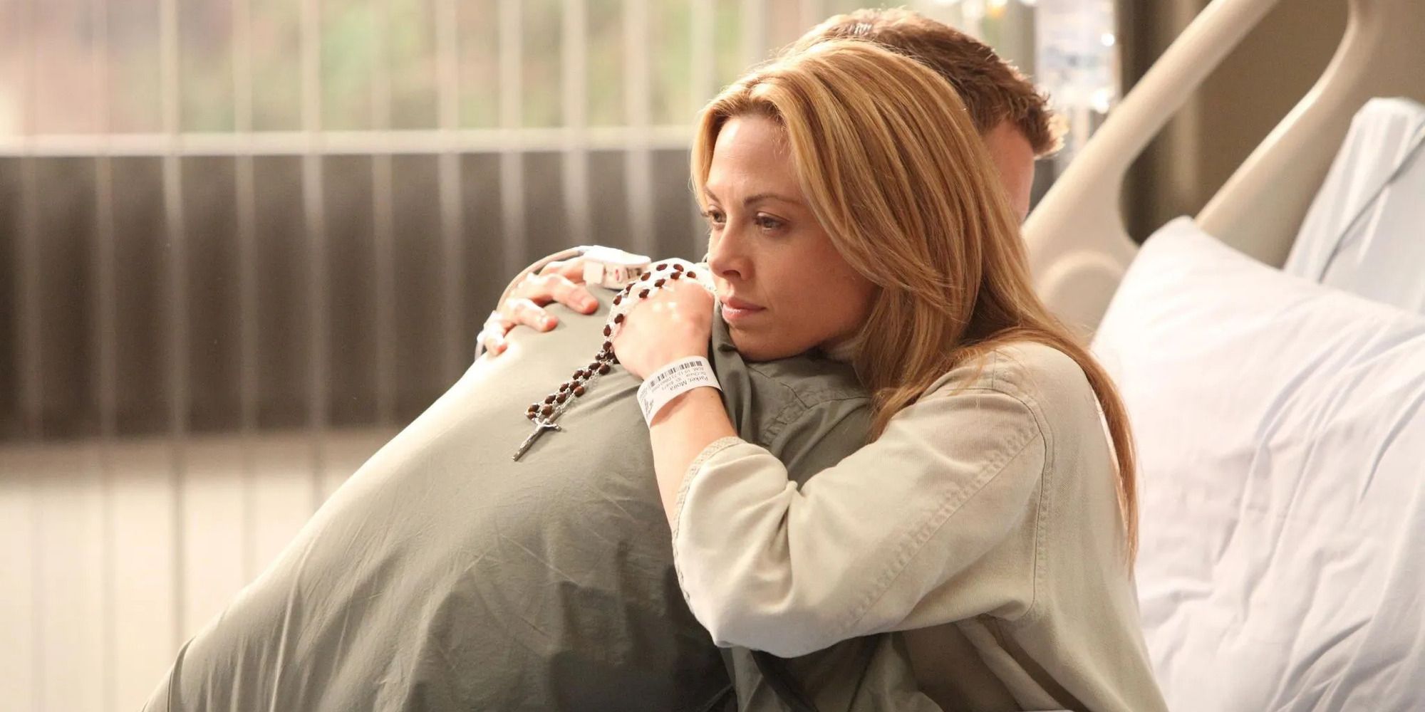 Chase and Moira Hugging in a Hospital Bed in House, M.D.