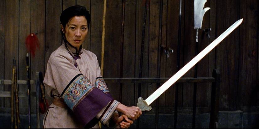 12 Coolest Swords In Movies & TV Shows 4 Michelle Yeoh as Shu Lien holding the Green Destiny Sword in Crouching Tiger, Hidden Dragon