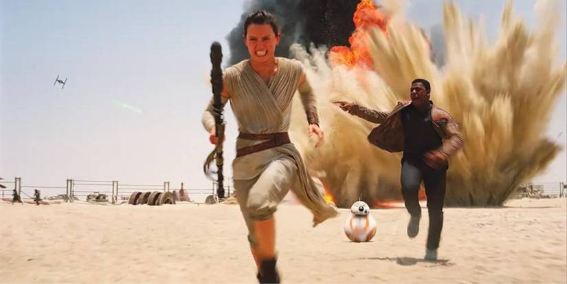 10 Highest Grossing Sci-Fi Movies Of All Time At The U.S. Box Office 8 Daisy Ridley as Rey and John Boyega as Finn running away from an explosion on Jakku in a scene from Star Wars: Episode VII - The Force Awakens.