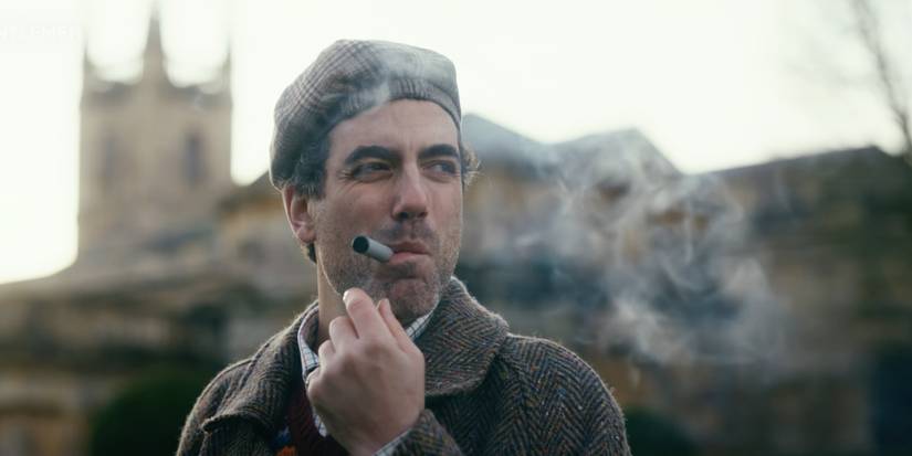 Daniel Ings smoking a cigar in The Gentlemen