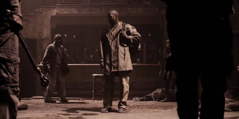 Denzel Washington as Eli prepares for a fight in The Book of Eli