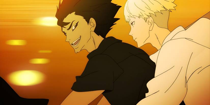 Akira smiles at Ryo while they ride on a motocycle from Devilman Crybaby.