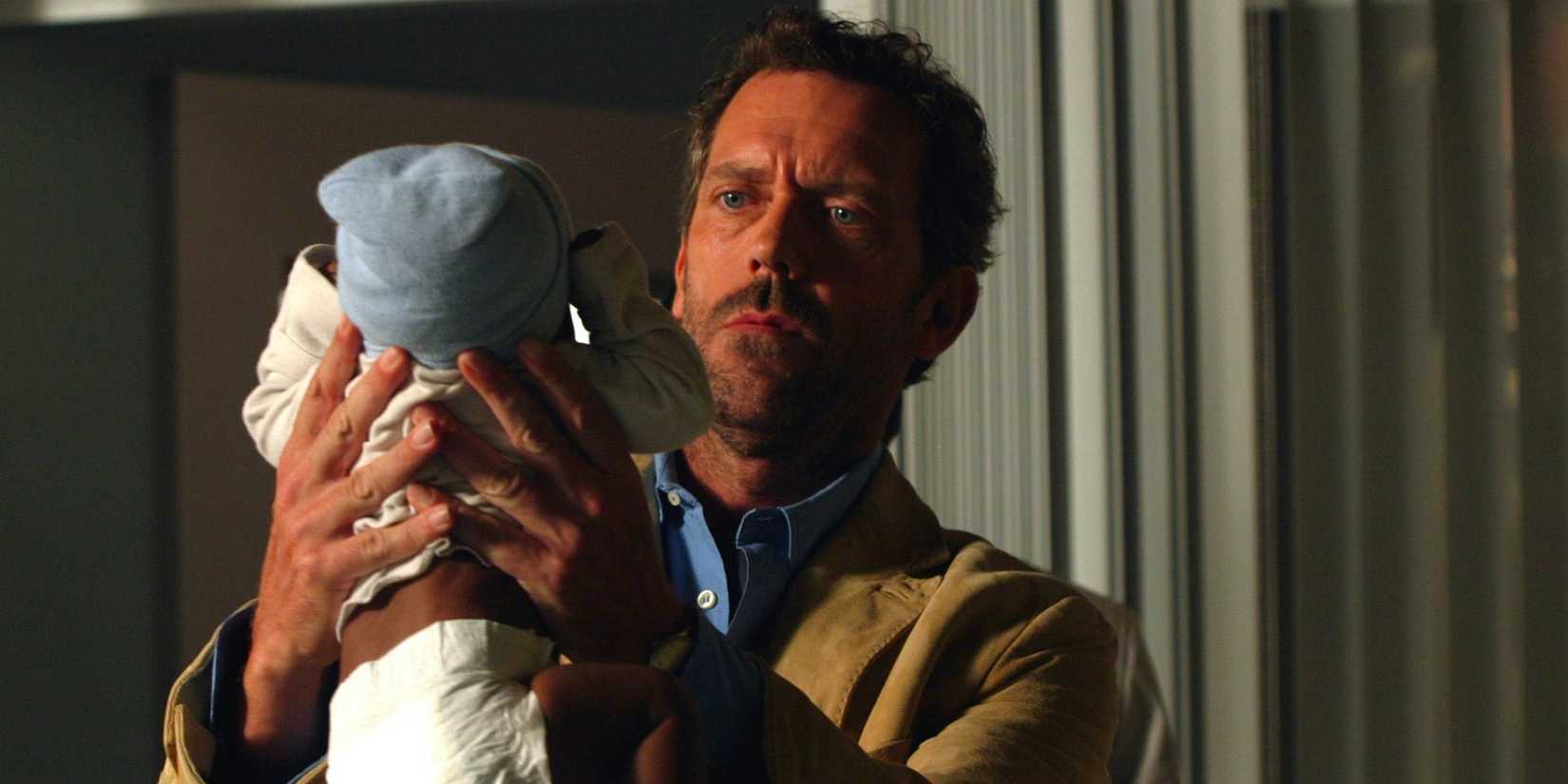 Dr. Gregory House (Hugh Laurie) holding a baby in season 1 episode 4 maternity