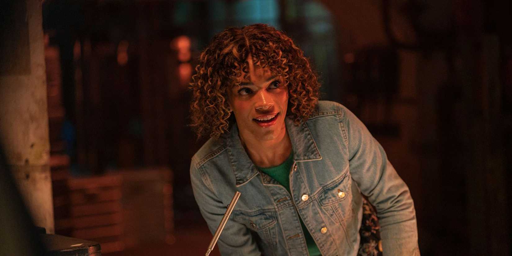 Rose Noble helping the Doctor and Donna from the console in Doctor Who.