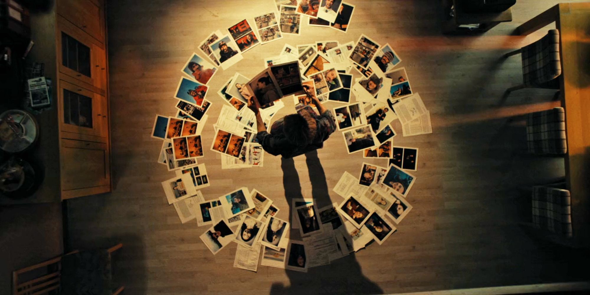 Spiral of Photo Evidence on Liz Danver's Kitchen Floor in True Detective Night Country