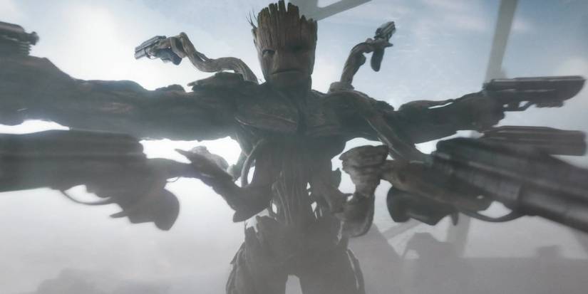 Groot wielding multiple guns in Guardians of the galaxy Vol. 3