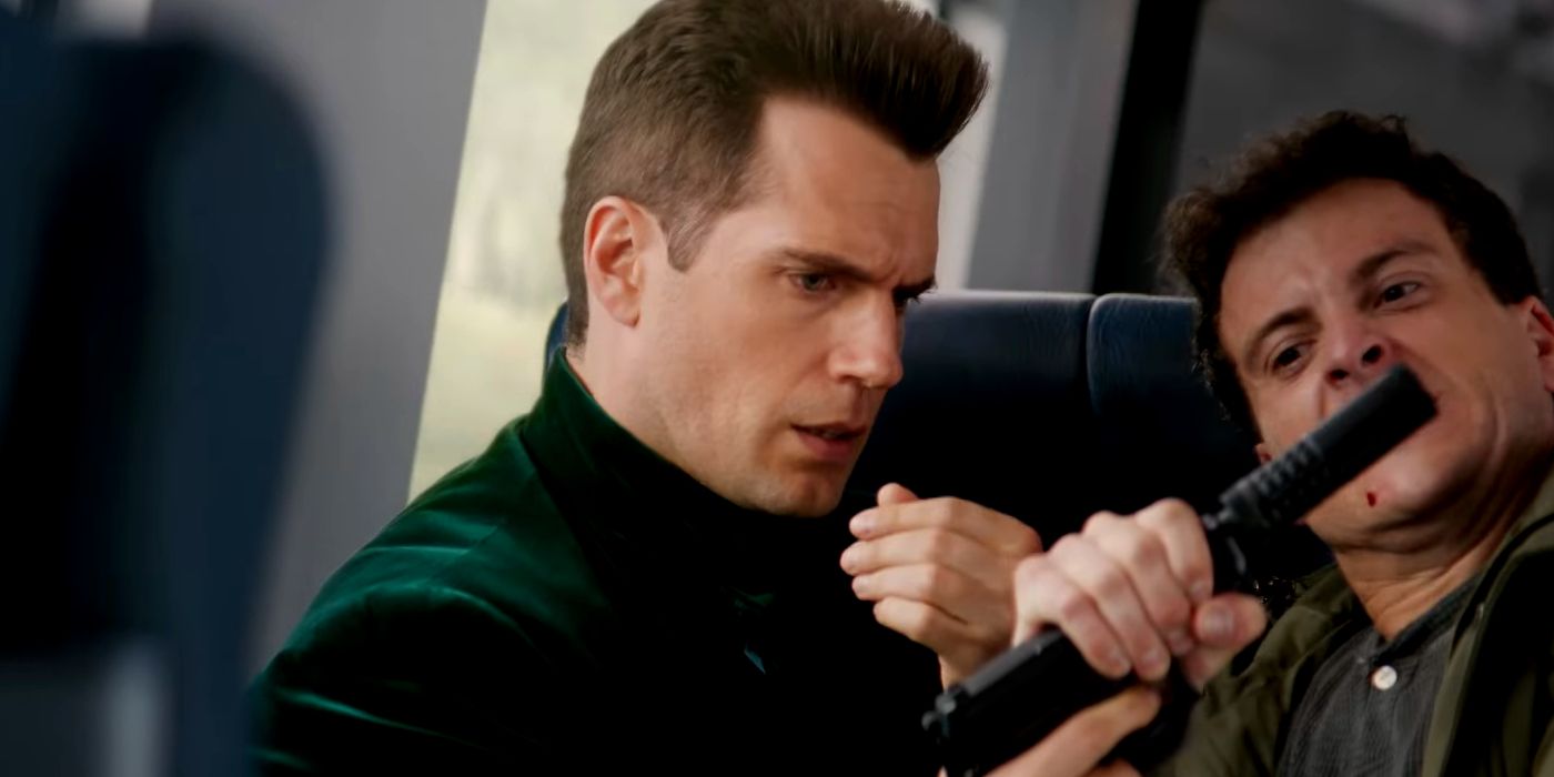 Henry Cavill as Agent Argylle fights someone on a Train in Argylle.