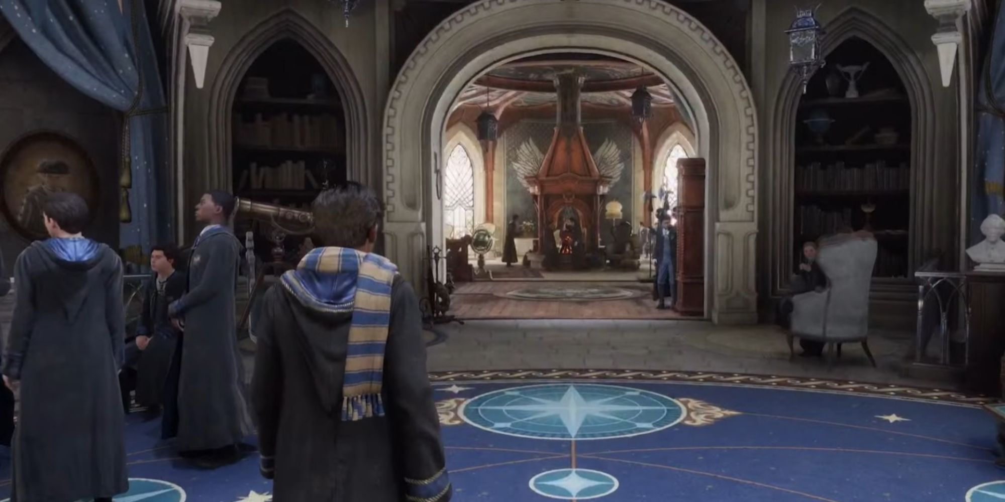 Player wearing Ravenclaw robes in Hogwarts Legacy standing in the Ravenclaw common room.