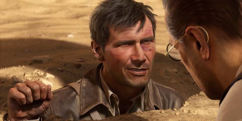 Индиана Джонс в игре Great Circle смотрит на злодея, окруженного песком.