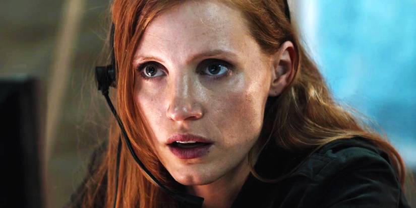 Jessica Chastain looking intently with a headset on in Zero Dark Thirty