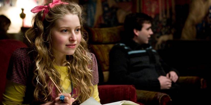 Jessie Cave writing in notebook in Harry Potter and the Half-Blood Prince