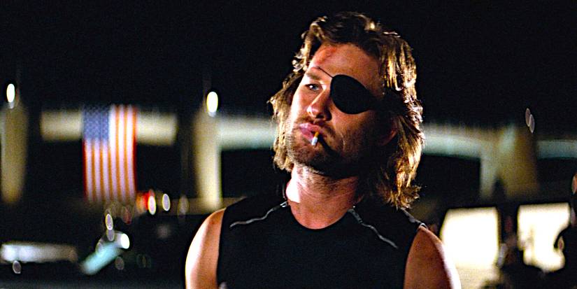 Kurt Russell smoking a cigarette and showing atтιтude as Snake Plissken in Escape From New York