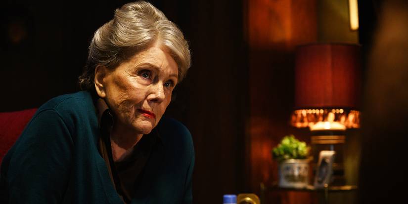 Diana Rigg as Ms Collins looks at an unseen character in Last Night in Soho