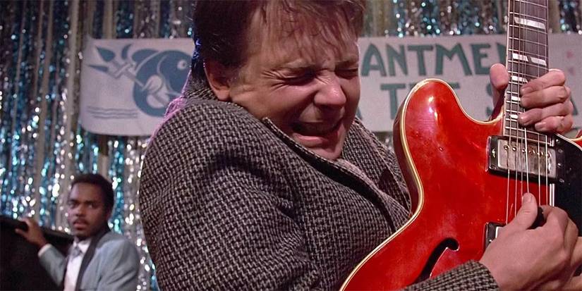 marty playing the guitar in back to the future
