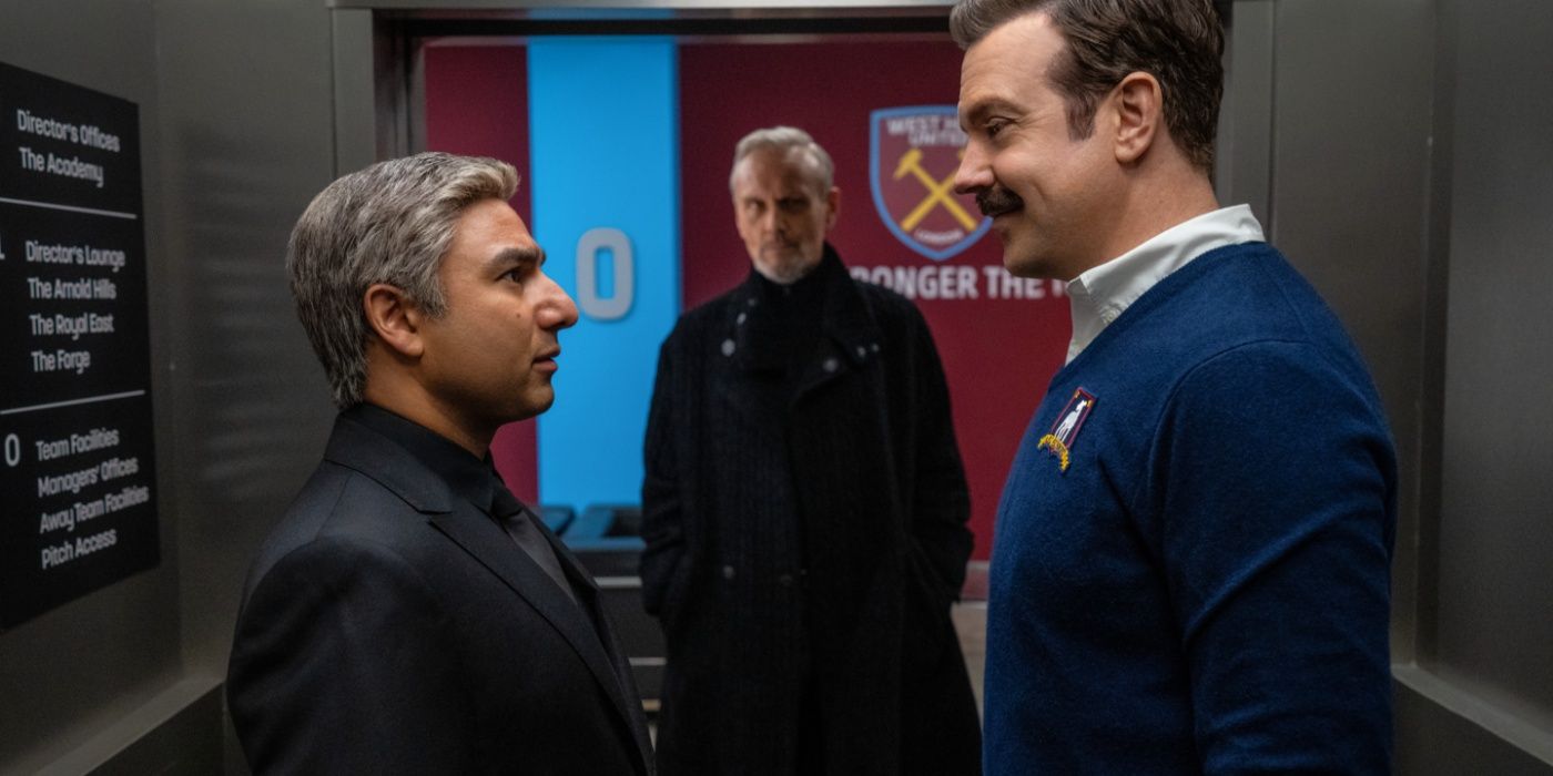 Ted (Jason Sudeikis) and Nate (Nick Mohammed) squaring up to each other in an elevator in Ted Lasso